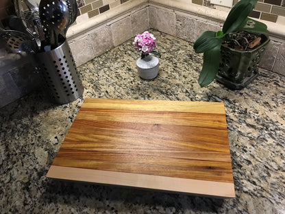 Canary Wood, Maple, and Teak Cutting Board