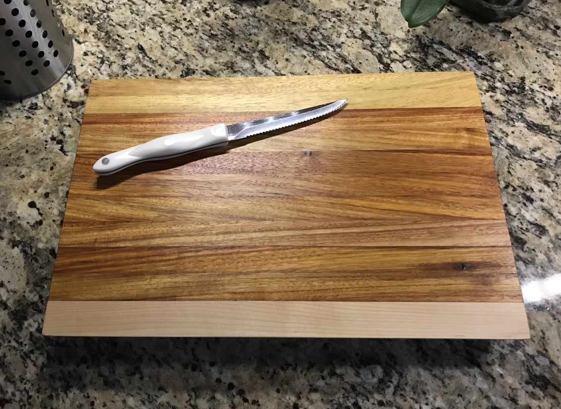 Canary Wood, Maple, and Teak Cutting Board