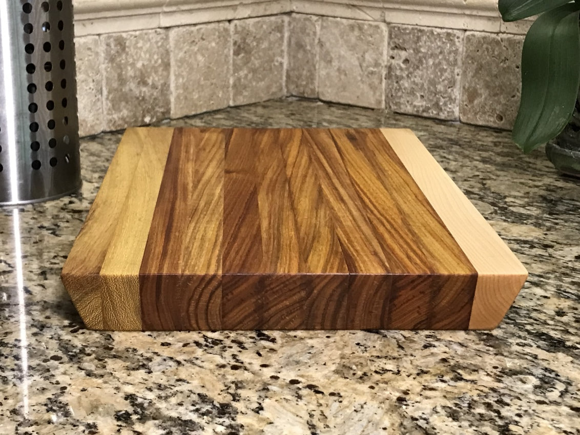 Canary Wood, Maple, and Teak Cutting Board