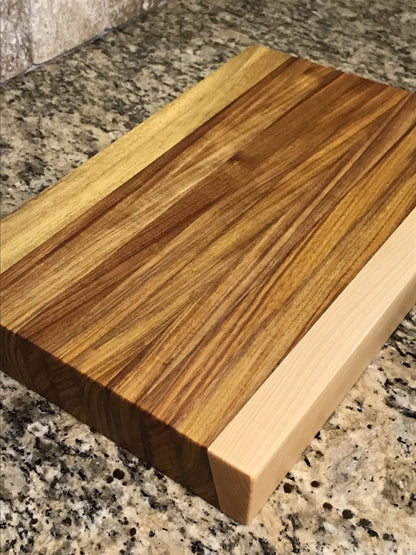 Canary Wood, Maple, and Teak Cutting Board