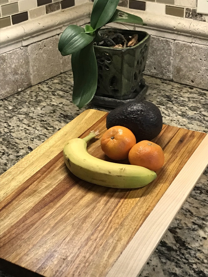 Canary Wood, Maple, and Teak Cutting Board